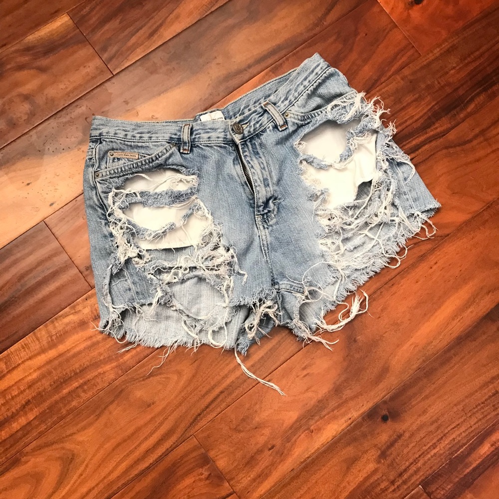 Calvin Klein distressed shorts.